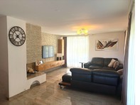 Exklusive 4.5-Zimmer-Gartenwohnung mit großem Garten und moderner Ausstattung